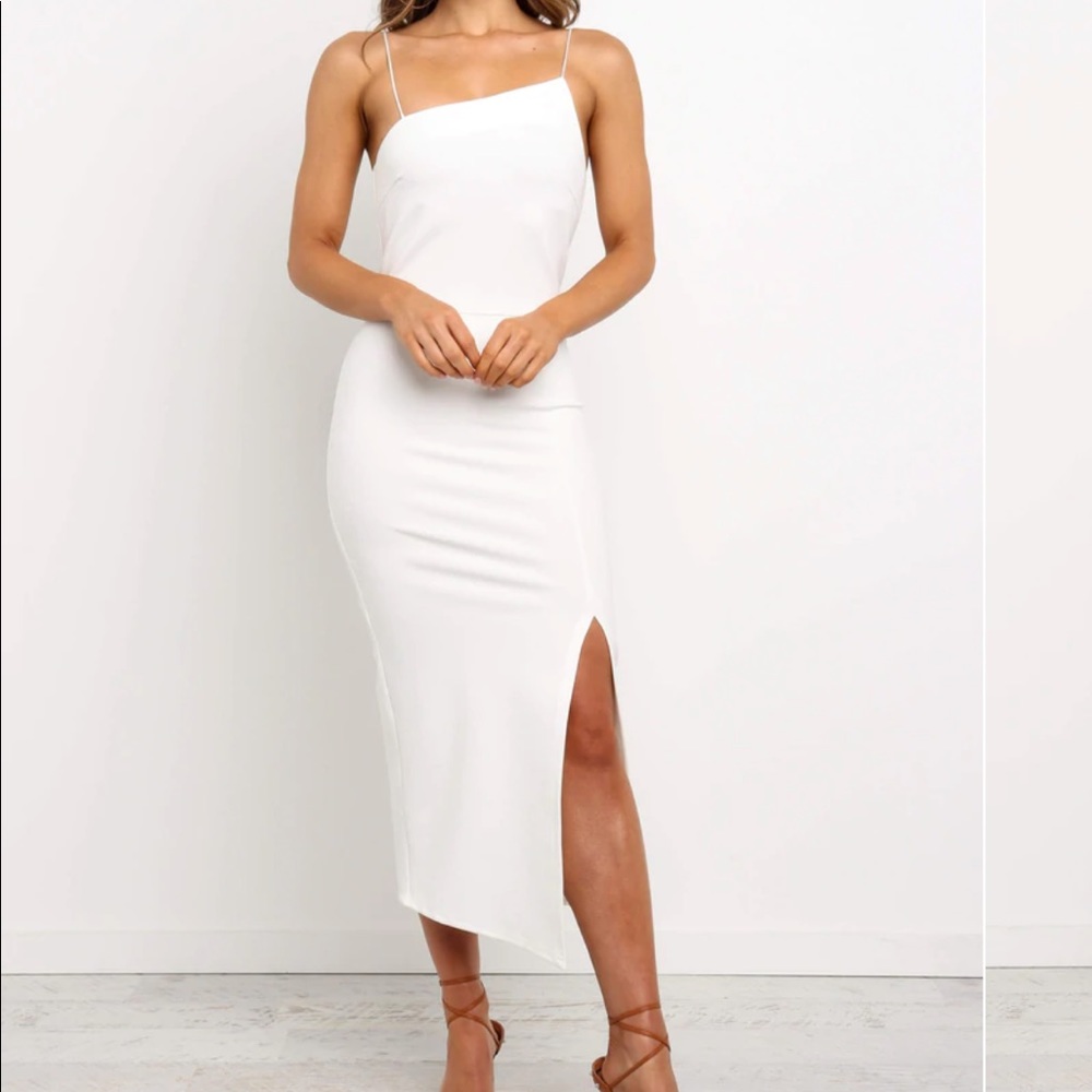 Never been worn Petal & Pup Zahara Dress. Sold out online. Tags still on!